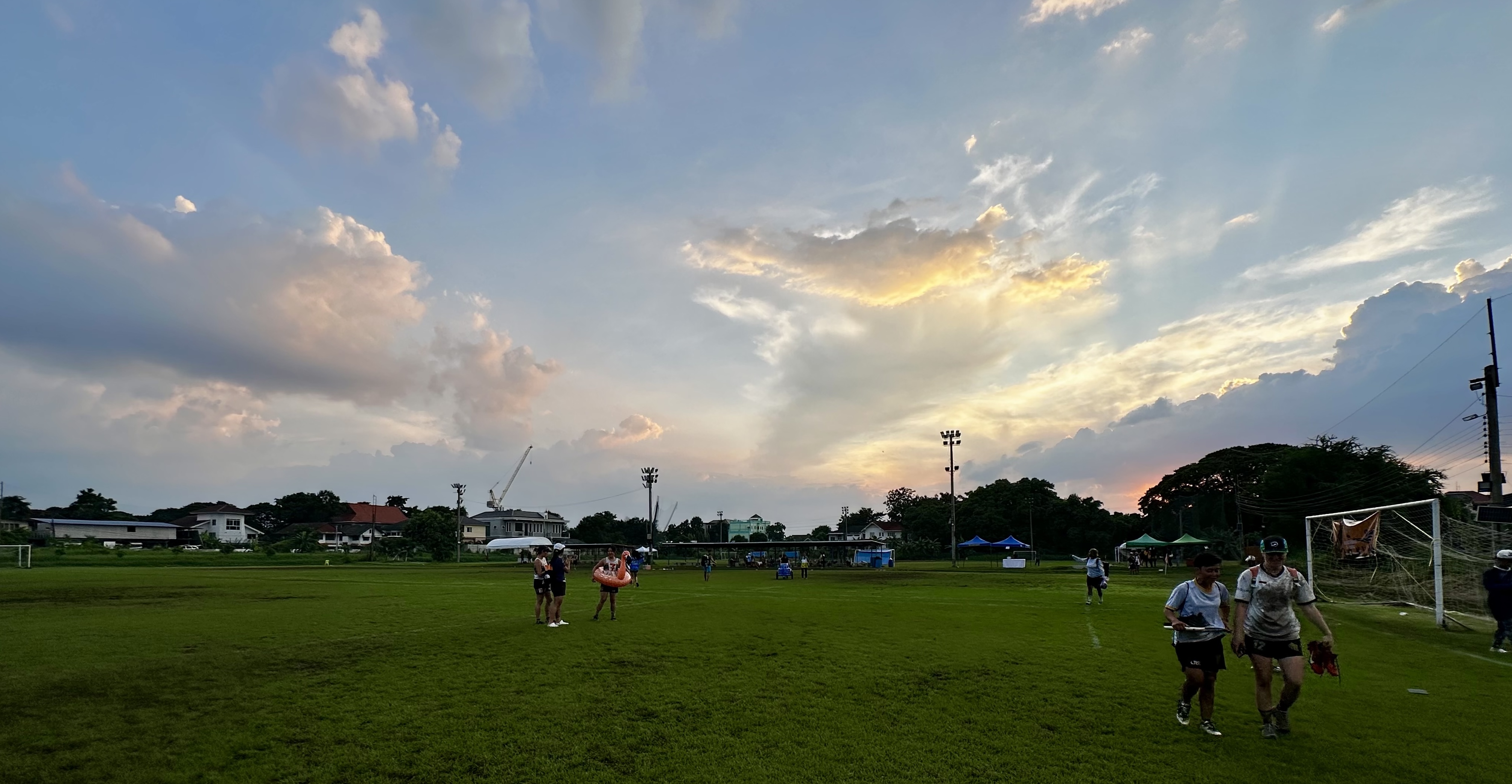 A view of a frisbee field in Bangkok as the sun sets